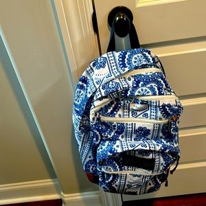 Blue and white Jansport backpack